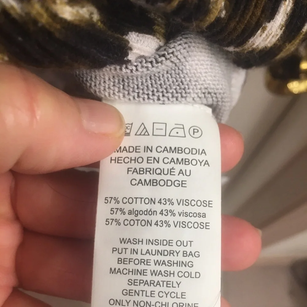Mk sweater over size will fit a med. cheetha p